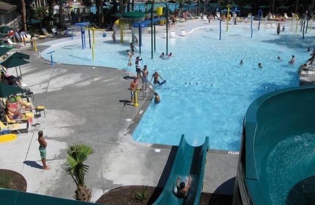 Resort Amenities! Next to Sanctuary Hotel. Short walk to beach. Screened porch