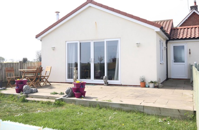 Sea View bungalow, spacious open plan and pet friendly.