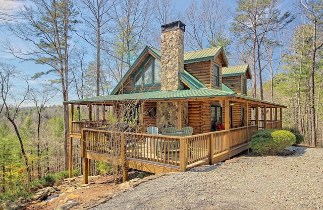 Secluded home on acreage with private hot tub, fireplace & wraparound deck