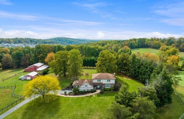 Serene 51-Acre Estate with Beautiful Farmhouse-Your Nature Retreat Awaits!