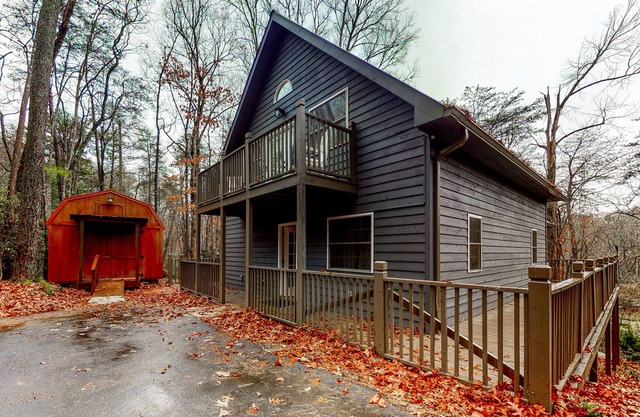 Serene Wooded Escape near the Lake W/ Free WiFi, Wraparound Deck, & Balcony