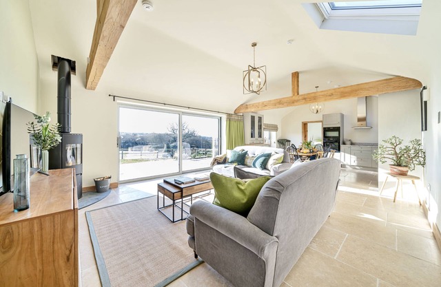 Situated on the border of Dorset and Devon, The Byre is superbly constructed barn-style property