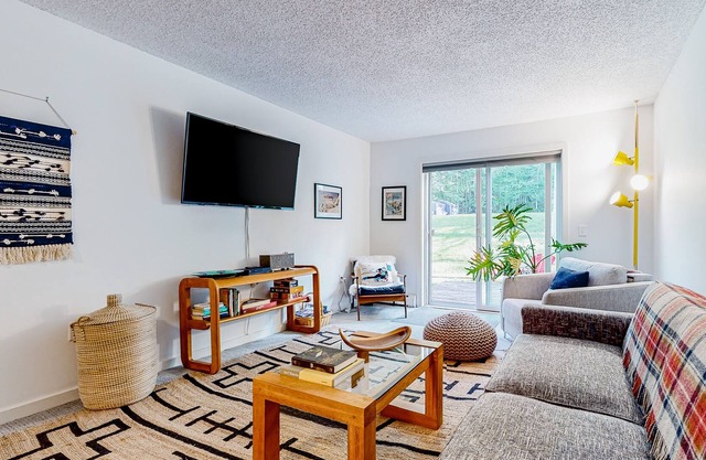 Ski-in/ski-out condo with patio, gym, game room & mountain view