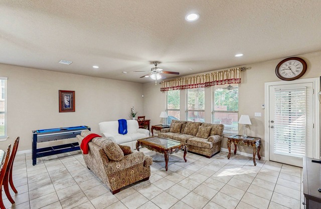 Snowbird-friendly home with private hot tub, foosball, air hockey, grill, patio