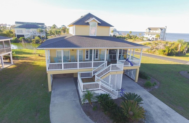 Southern Sunshine! Beach views and steps to the sand, short ride to the pool.