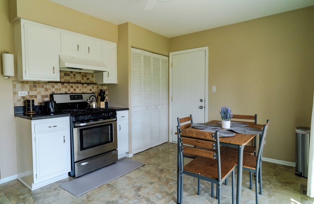 "Spacious 2BR Retreat with Office, Stunning Backyard & Grill in Hanover Park"