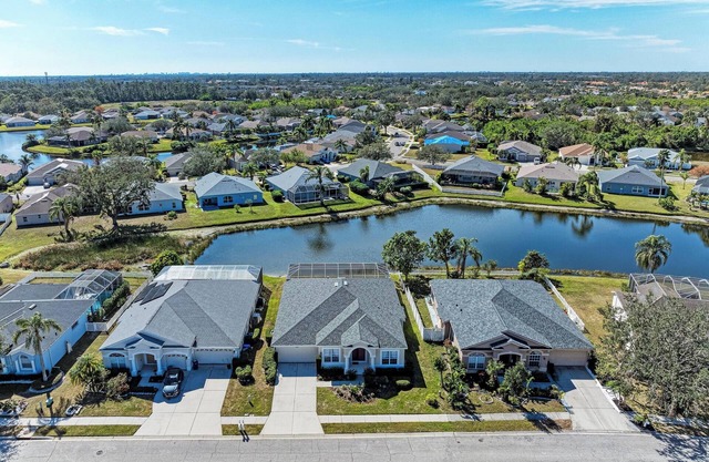 Spacious, family friendly 4-bedroom, pool/spa lakefront home.