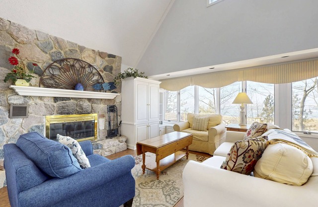 Spacious lakefront home with panoramic views and private beach