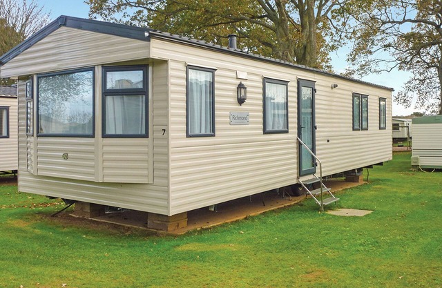 Spacious modern caravan with one double and two twin.