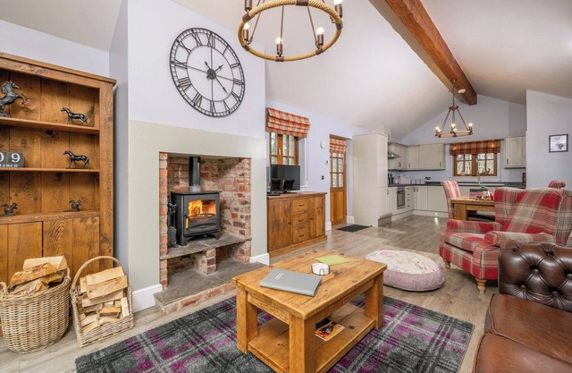 Spacious riverside lodge with mountain views.