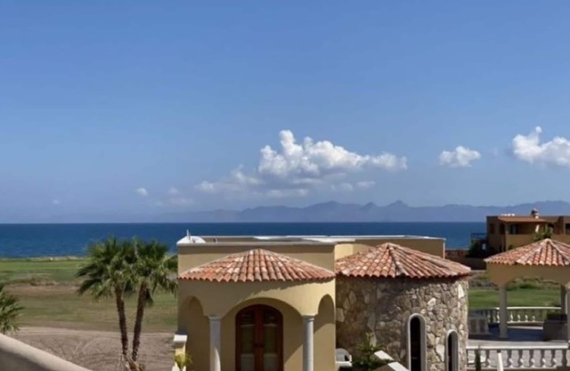 Spectacular Sea, Mountain and Golf Course View home