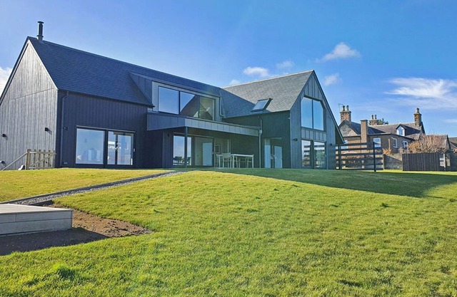 Spectacular uninterrupted views of Loch Fleet and the countryside from every room