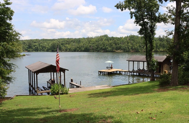Spend Lake Daze at Lake Sinclair retreat w/renovated basement and private dock!