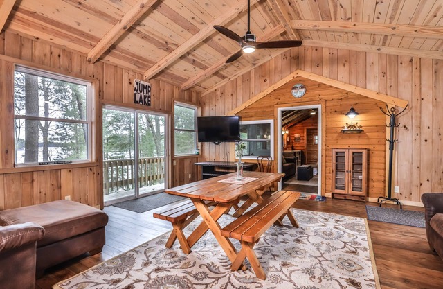 Splendid lakefront home with deck, private W/D, fireplace, and patio area