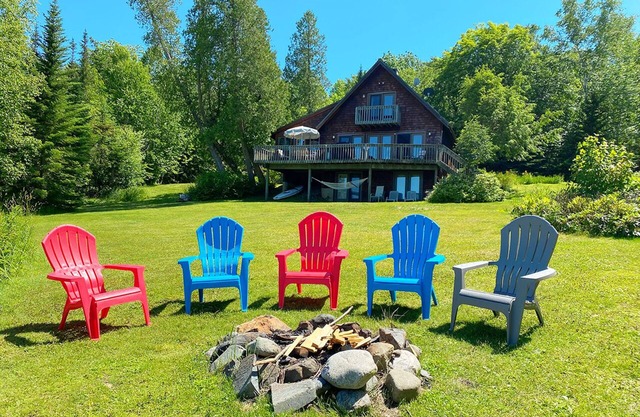 Stone - This Rangeley Lake home has a very level entry to the water with a huge deck!
