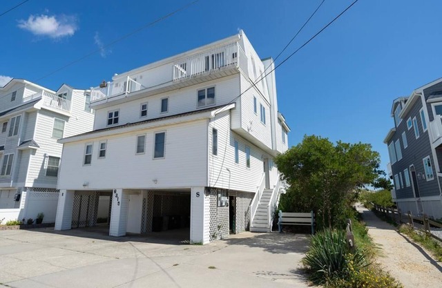 Stunning Beach Front Home with Unobstructed Ocean Views!