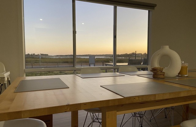 Stunning lake views, entertainer’s deck, fire pit, kids toys & books