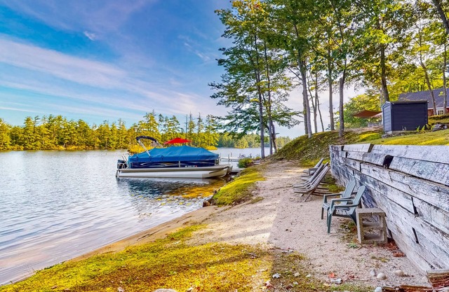 Stunning lakefront home with private dock, deck, firepit, and lake view