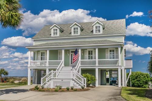 STUNNING NEW LISTING - Ocean and Beach Views TWO GOLF CARTS - Sleeps 12
