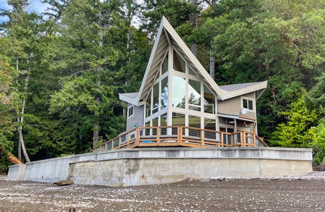 Stunning waterfront property with private beach, amazing views, and huge loft