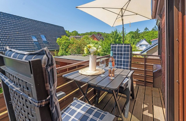 Summer breeze vacation apartment with balcony in Haus Hüttmann in Bad Malente