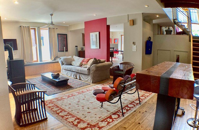Sun-filled designer home with private garden and garage near Old Montreal
