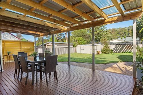 Sunlit Shores Mimosa 4BR Coastal Home with Yard & Loft Suite