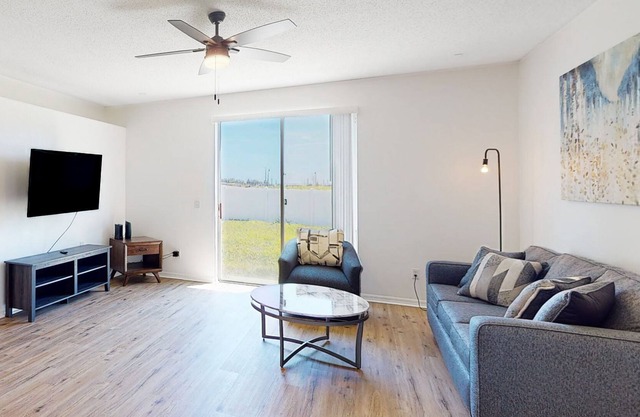 Sunny home near Disney with enclosed backyard, fast WiFi, W/D, patio, central AC
