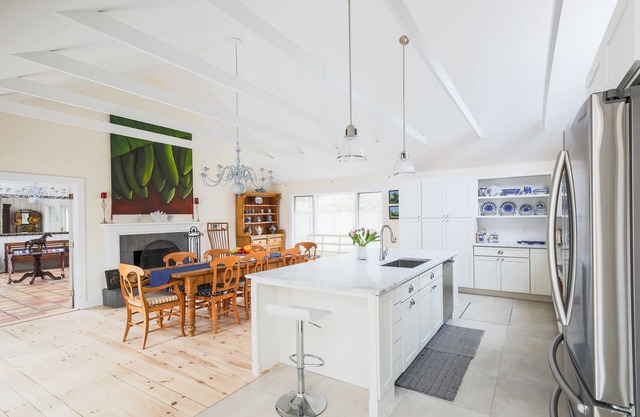 SUNNY, OPEN AND SPACIOUS TASTEFULLY RENOVATED OASIS TWO MINUTES TO TOWN