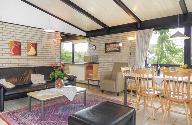 The detached vacation home with garden and spacious terrace is located in the forest holiday park in