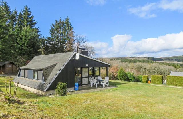 The detached vacation home with garden and spacious terrace is located in the forest holiday park in