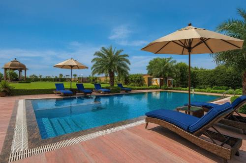 The Ginger, Vrindavan #Big Swimming Pool #luxury Rooms # Lush Garden # Family Friendly # Kids Play Zone # Calm & Spiritual Vibes # Away From City Hustle# By elegance group#