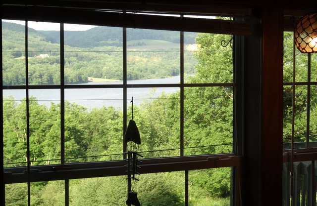 The road less travelled. Rural pet friendly home with lake view and office.