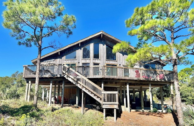 This coastal St. George Island home offers the perfect island retreat for your dream vacation.