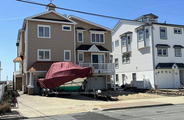 This lovely 3 bedroom 2 and a half bath home is located directly on the bay in Sea Isle City