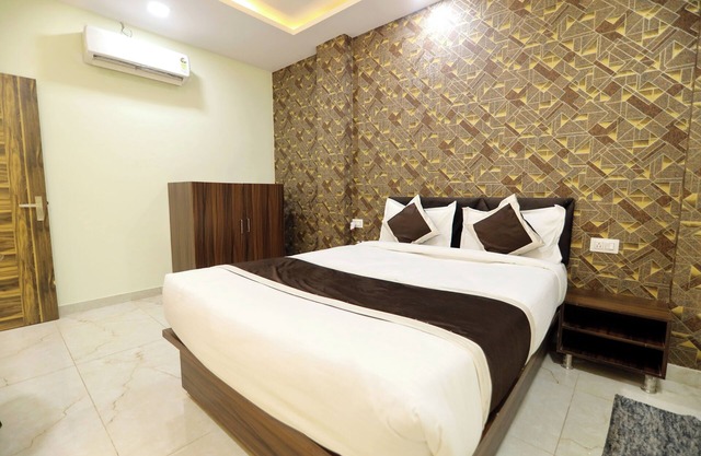 This room features a spacious king-sized bed, designed for maximum comfort