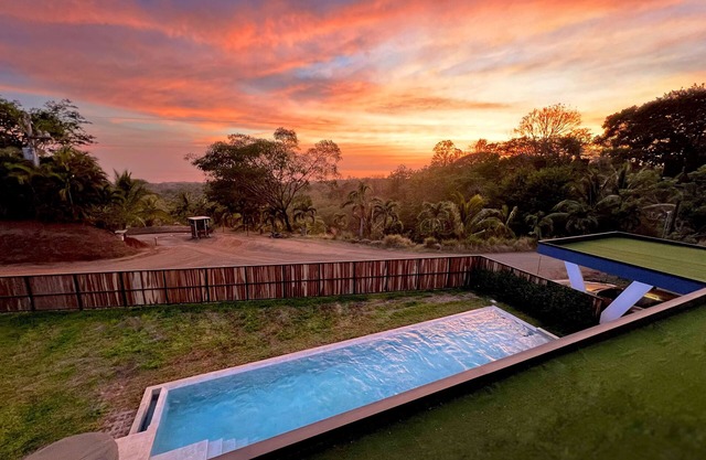 This stunning home offers a perfect blend of luxury and natural beauty.