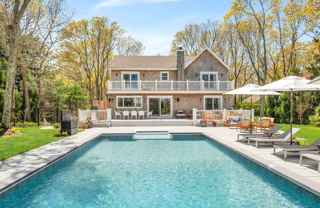 Timeless East Hampton retreat with amazing outdoor space, heated pool, wide.