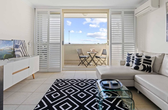 Top Floor Apartment with Balcony in Great Location