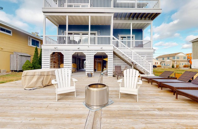 Town of South Bethany canal-front home with 2 balconies, firepit, & kayaks