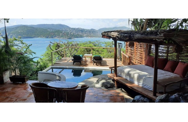 Tropical Artist's Bungalow with panoramic sea and bay views and private pool.