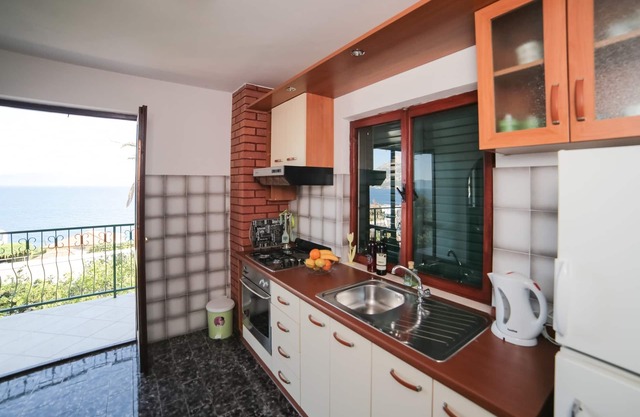 Two bedroom apartment with balcony and sea view Podaca, Makarska (A-11588-d)