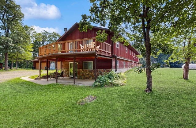 Two-family retreat with 2 kitchens, wooded charm near lakes, trails & adventure