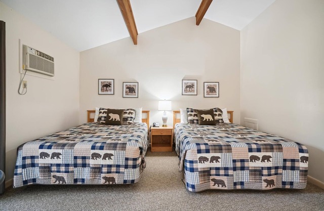 Two Queen Bed Standard Hotel room with outdoor heated pool 201