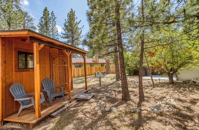 Updated single-level ranch with fenced yard, fire pit, spa, and outdoor dining!