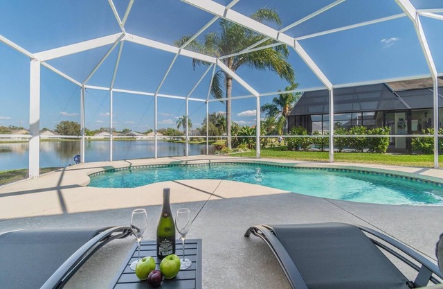 Villa Madeira -Stylish Pool Abode with Lake Views by Gulfcoast Holiday Homes