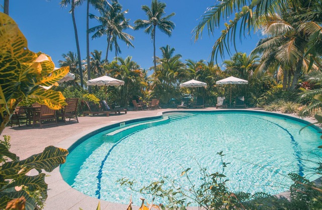 Villa RUA lower floor of colonial style villa set in tropical gardens with pool