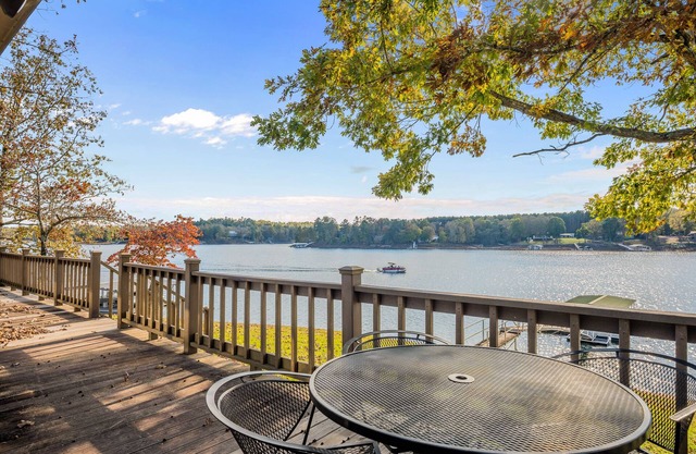 "WATER'S EDGE" - Main Channel views, flat lot, boat slip and PWC port!