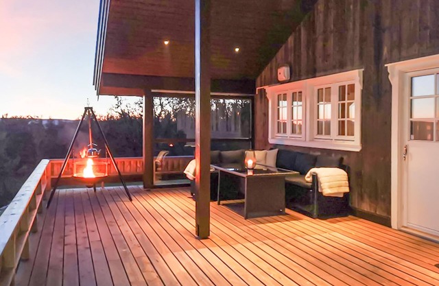 Welcome to this beautiful and family friendly wooden house with hot tub and mountain views.