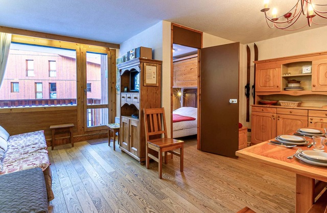 Well-Equipped 1-Bed Apartment with Garage, Balcony & Free Shuttle Access